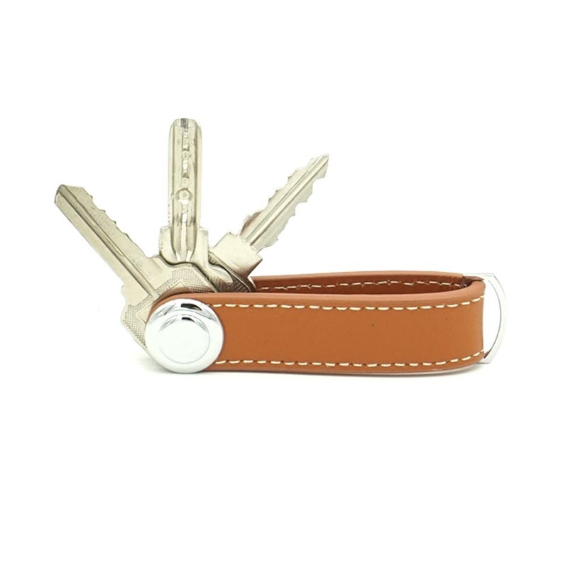 ERCRYSTO Compact Key Holder - Stylish & Practical Pocket Key Organizer With Secure Locking Mechanism. (Brown) - Image 1